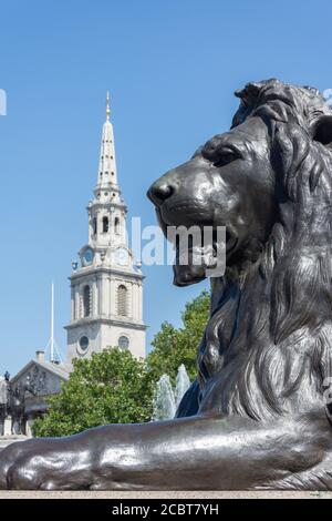 Lion Statue and St Martin-in-the-Fields Church, Trafalgar Square, City of Westminster, Greater London, England, United Kingdom Stock Photo