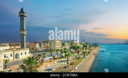 Panoramic view  of embankment  and tall minaret in old city Bizerte. Tunisia, North Africa Stock Photo