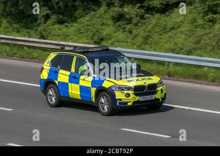2019 BMW X5 Xdrive30D AC Auto; British Police cars Tactical Operations unit BMW cars driving on the M6 motorway near Preston in Lancashire, UK. Stock Photo