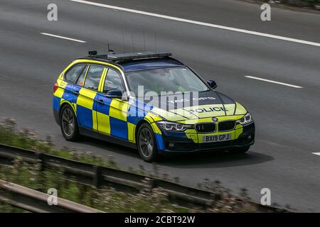 2019 BMW 330D Xdrive AC Auto; British Police cars Tactical Operations unit BMW cars driving on the M6 motorway near Preston in Lancashire, UK. Stock Photo