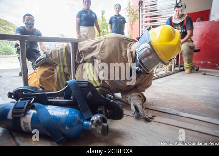 Coatepec, Veracruz, México. 15th Aug, 2020. A group of volunteer fireginghters are making his training exercises for rescue and to remove posible injures persons. This gropu of volnteers work in moore tnah 10 communities and they are the responsables to do the rescue and movilizations of COVID-19 patients. Credit: Hector Adolfo Quintanar Perez/ZUMA Wire/Alamy Live News Stock Photo