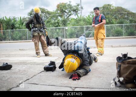 Coatepec, Veracruz, México. 15th Aug, 2020. A group of volunteer fireginghters are making his training exercises for rescue and to remove posible injures persons. This gropu of volnteers work in moore tnah 10 communities and they are the responsables to do the rescue and movilizations of COVID-19 patients. Credit: Hector Adolfo Quintanar Perez/ZUMA Wire/Alamy Live News Stock Photo