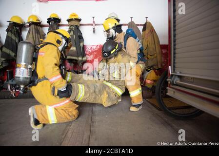 Coatepec, Veracruz, México. 15th Aug, 2020. A group of volunteer fireginghters are making his training exercises for rescue and to remove posible injures persons. This gropu of volnteers work in moore tnah 10 communities and they are the responsables to do the rescue and movilizations of COVID-19 patients. Credit: Hector Adolfo Quintanar Perez/ZUMA Wire/Alamy Live News Stock Photo