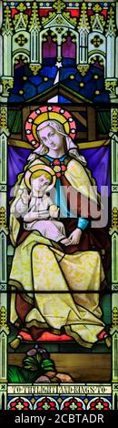 Epiphany, Virgin Mary, baby Jesus, Christmas,  stained glass, window, by Mayer & Co. 1873, Brinton, Norfolk, UK Stock Photo