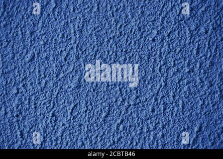 Rough unsmooth dark blue wall texture Stock Photo