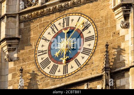 Clock Tower of New Town Hall (Rathaus) close-up, Munich, Bavaria, Germany. It is old landmark of Munich located on Marienplatz square. Detail of Gothi Stock Photo