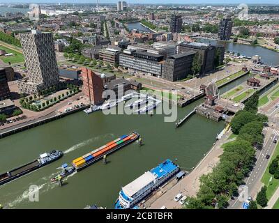 Cargo ship is going in the New Meuse (the Nieuwe Maas) river locks. Rotterdam, the Netherlands. Stock Photo