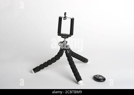 black tripod tripod for selfies on a white background Stock Photo