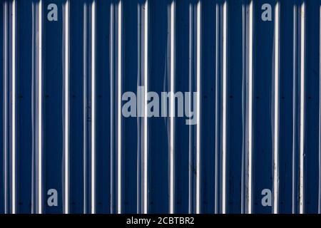 Abstract image of blue ribbed metal cladding on a building in Steveston British Columbia Canada Stock Photo