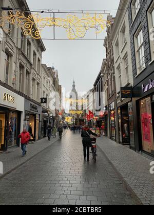 People walking through the shopping street in Breda. Breda / Netherlands Stock Photo