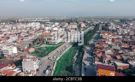 good looking wide aerial shoot from a little village with interesting angle - there is a creek over there. photo has taken at aydin/turkey. Stock Photo