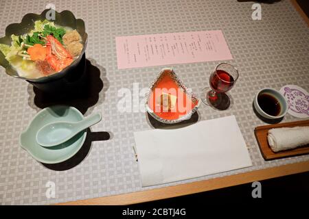 Japanese Dinner set and appetizer on wooden table in Traditional ryokan resort Stock Photo