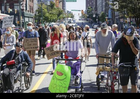 Vancouver, Canada. 15th Aug, 2020. Protestors participate in a memorial march in Vancouver, British Columbia, Canada, Aug 15, 2020. Dozens of protestors took down the street to commemorate their friends and family members who died from overdose during the COVID-19 pandemic in the past months. Credit: Liang Sen/Xinhua/Alamy Live News Stock Photo