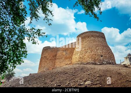 Tarout Castle, Qatif, Saudi Arabia in blue sky with clouds background. Stock Photo