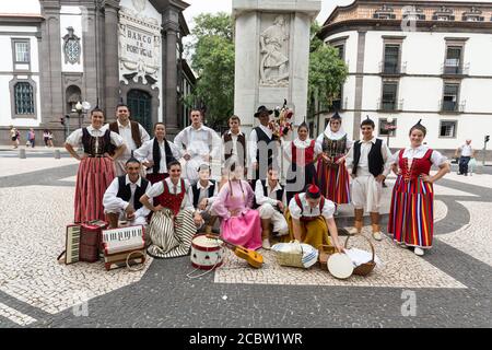 FUNCHAL, PORTUGAL - SEPTEMBER 2, 2015: Dancers with local costumes demonstrating a folk dance during the Wine Festival in Funchal on the Madeira, Port Stock Photo