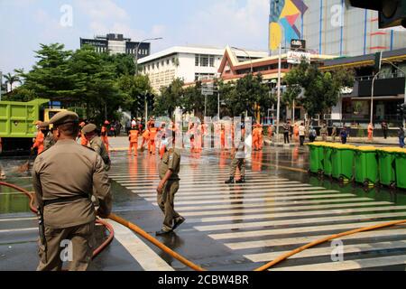 Jakarta, Indonesia - May 23, 2019: Officers cleared Jalan MH Thamrin after the Jakarta riots on May 22. Stock Photo