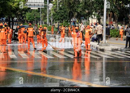 Jakarta, Indonesia - May 23, 2019: Officers cleared Jalan MH Thamrin after the Jakarta riots on May 22. Stock Photo