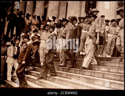 Japanese Surrender to Lord Louis Mountbatten in Singapore 12 September 1945 These original photographic prints were bought home from the far east by the photographers father in the bottom of a tool box after the war. They are in a family album and copied by this photographer SINGAPORE. 1945-09-12. ADMIRAL LORD LOUIS MOUNTBATTEN SUPREME ALLIED COMMANDER, SOUTH EAST ASIA COMMAND (SEAC), ACCEPTED THE SURRENDER OF JAPANESE FORCES IN THE AREA DURING A SURRENDER CEREMONY HELD IN THE COUNCIL CHAMBER, MUNICIPAL BUILDING, SINGAPORE. IN THE ABSENCE OF FIELD MARSHAL COUNT TERAUCHI, JAPANESE COMMANDER IN Stock Photo