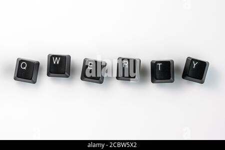 Computer keyboard keys spelling QWERTY, isolated on white background Stock Photo