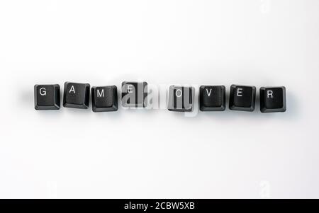 Computer keyboard keys spelling Game Over, isolated on white background Stock Photo