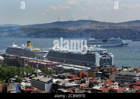 Cruise ships docked in port along the Bosphorus at Istanbul in Turkey. Stock Photo