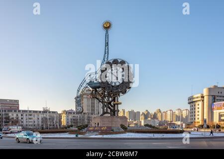 Tianjin / China - February 14, 2016: Tianjin Century Clock located on the on the west side of Tianjin railway station by the Haihe River Stock Photo