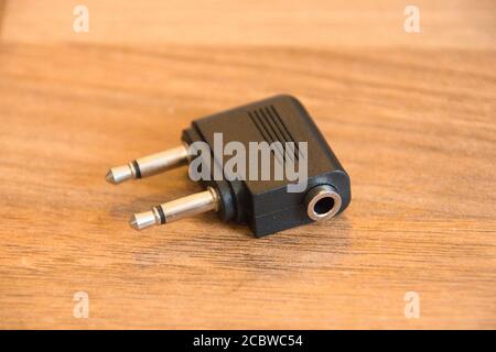 A 3.5 mm Male Airline Headphone TS connector for Airplanes. Airplane headphone adapter connector isolated Stock Photo - Alamy