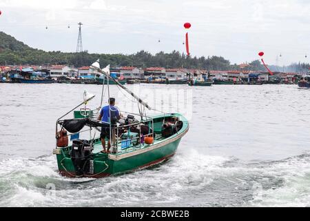 Lingshui. 16th Aug, 2020. A fishing boat sails on the sea as the summer fishing moratorium ended in Xincun Township in south China's Hainan Province, Aug. 16, 2020. Credit: Zhang Liyun/Xinhua/Alamy Live News Stock Photo