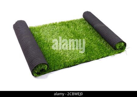 artificial green grass, lawn isolate on white background close up. Stock Photo