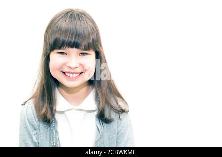 Child teenager smiling on white background place for inscription Stock Photo