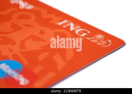 View of ING Bank credit and debit card isolated on white. Focua on the words ING Stock Photo