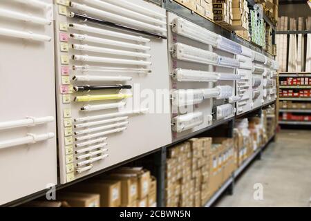 Abstract background section of shelf lighting equipment in supermarket or hypermarket retail as a modern lifestyle shopping concept with bokeh Stock Photo