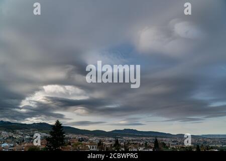 Dramatic sky. Interesting unusual lenticular clouds. Stock Photo