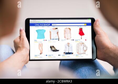 Couple Family Shopping Online In Ecommerce Shop Stock Photo
