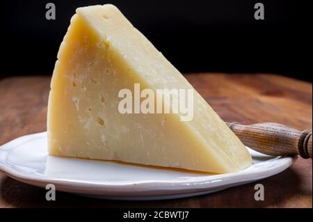 Italian cheeses collection, matured pecorino romano hard cheese made from sheep melk close up Stock Photo