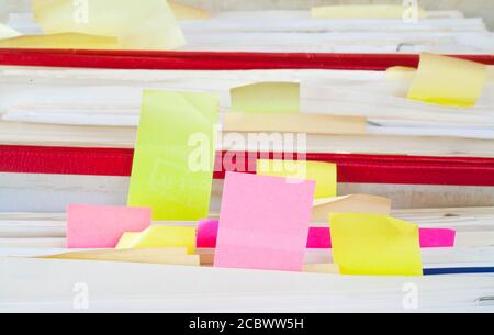 messy file folders and documents,  bureaucracy and red tape concept. good copy space Stock Photo