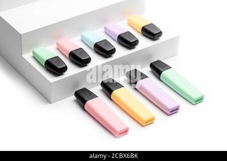 9 Pastel highlighters on white background side view Stock Photo