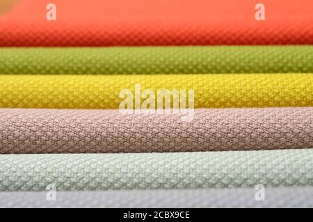 samples of textiles of different colors in the whole frame Stock Photo