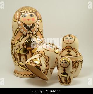 traditional Russian nesting dolls on white background Stock Photo