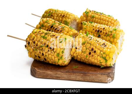 Grilled  sweet corn on the cob isolated on white Stock Photo