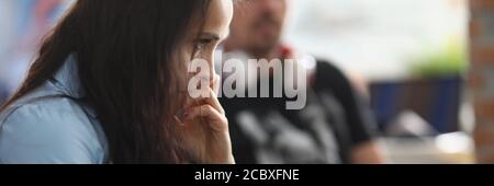 Male colleague sitting near Stock Photo