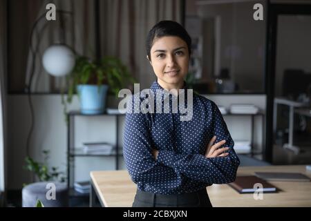 Profile portrait of confident young indian businesswoman. Stock Photo
