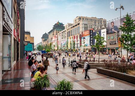 Shoppers at Wangfujing Walking Street, the most well-known and prosperous shopping street in Beijing, capital of China. Stock Photo