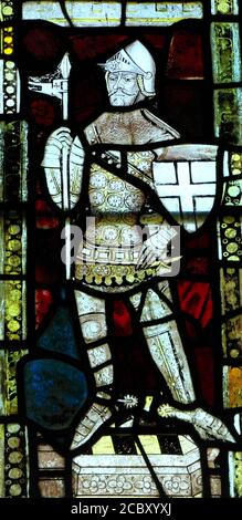 14th century, stained glass window, medieval knight, in armour, Castle Acre, Norfolk, England, UK Stock Photo