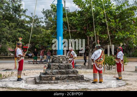 Danza de los Voladores or Dance of the Flyers is a traditional pre-Hispanic ceremonial ritual that is still performed today.  It was named an intangib Stock Photo