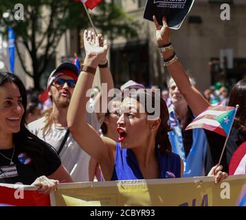 Alexandria Ocasio-Cortez marching in New York City Puerto Rican Day parade . Stock Photo