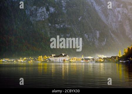 Beautiful light during the autumn season in Hallstatt, Austria, The light of the sun shines down on the city, making the city look beautiful. Stock Photo