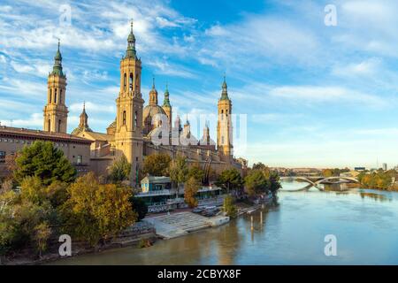Nuestra Basilica de Senora del Pilar reflected in the water one morning, Zaragoza, Spain. Stock Photo