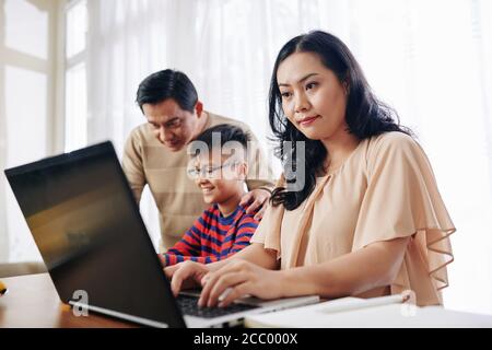 When mother is working from home Stock Photo