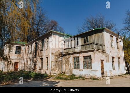 An old run down, weather beaten house that is in need of repair, housing problems. Stock Photo